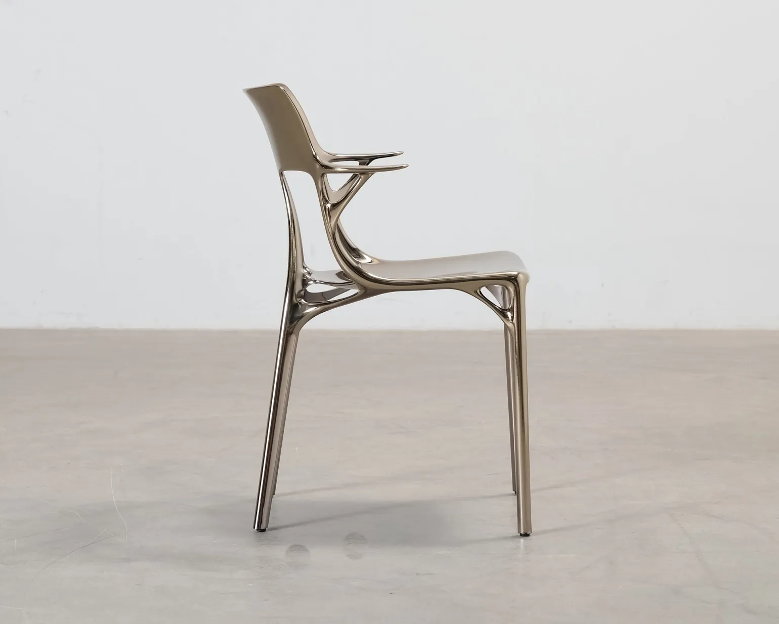 Kartell A.I. Metal stol brons